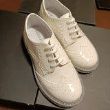 Francesine primi passi in VERA PELLE  di vernice bianca con para grigia