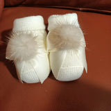 Babbucce col.panna con pon pon di pelliccia