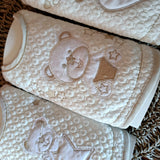 Tris bavette con orsetti sui toni del beige