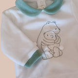 Clinico due pezzi con orsetto e pon pon bianco e verde salvia