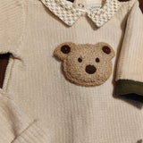 Tutina ciniglia luxury beige con teddy in rilievo e dettagli verde
