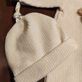 Tutina ciniglia luxury beige con teddy in rilievo e dettagli verde