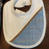 Bavetta  con treccia di cuoio e effetto jeansato coordinato con tutina e cuffietta