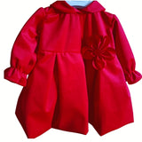 Abito velluto rosso con manica a sbuffo e fiore sul lato