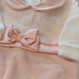 Tutina ciniglia luxury color pesca con corpino brillantinato e fiocco in satin