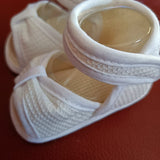 Sandaletto bianco di tela con nodo