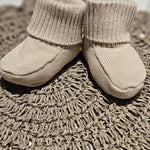 babbucce in cotone beige per neonato unisex