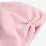 Klaiadì corredino completo bavetta e cappellino  del tema fiorellino rosa