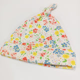 Dirkje cappellino di cotone organico tema floreale puntinato