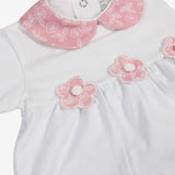 Completo due pezzi in cotone bianco e malva con ricami floreali