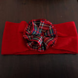 Fascetta natalizia rossa con fiore in tartan a balze  centrale